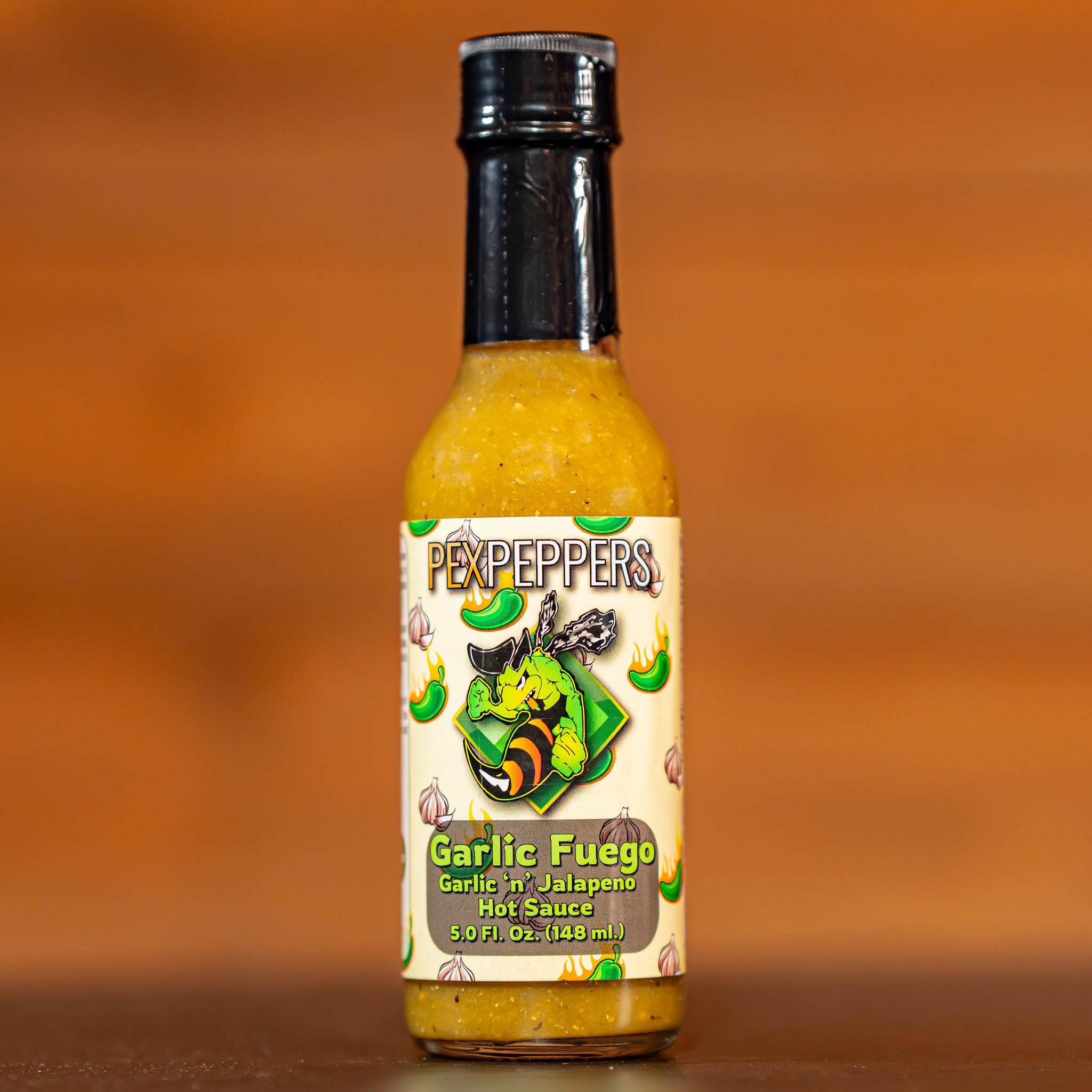 pepper plant garlic hot sauce Garlic Fuego Jalapeno Hot Sauce – PexPeppers Hot Sauce